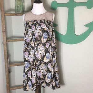 Navy Floral swing dress with lace detail.